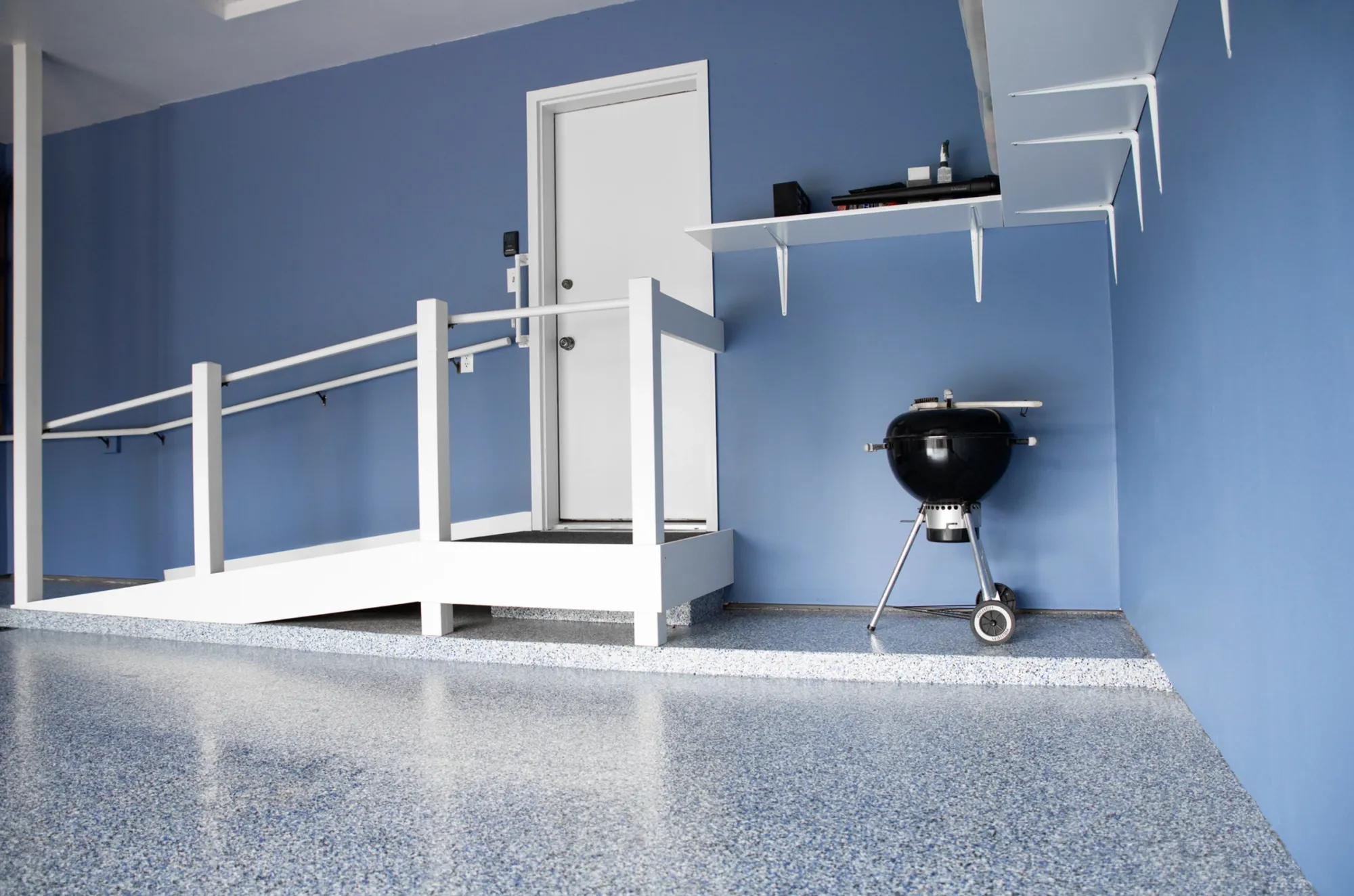 Decorative flake epoxy garage floor coating in a Georgetown, Delaware home