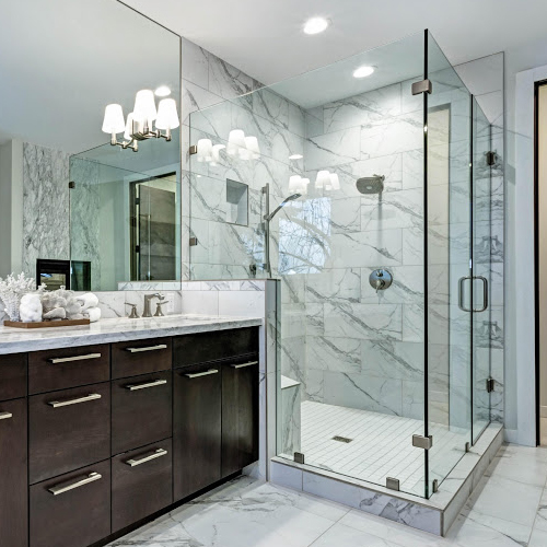 Custom frameless glass corner shower enclosure installed by Atlantic Source in Delaware